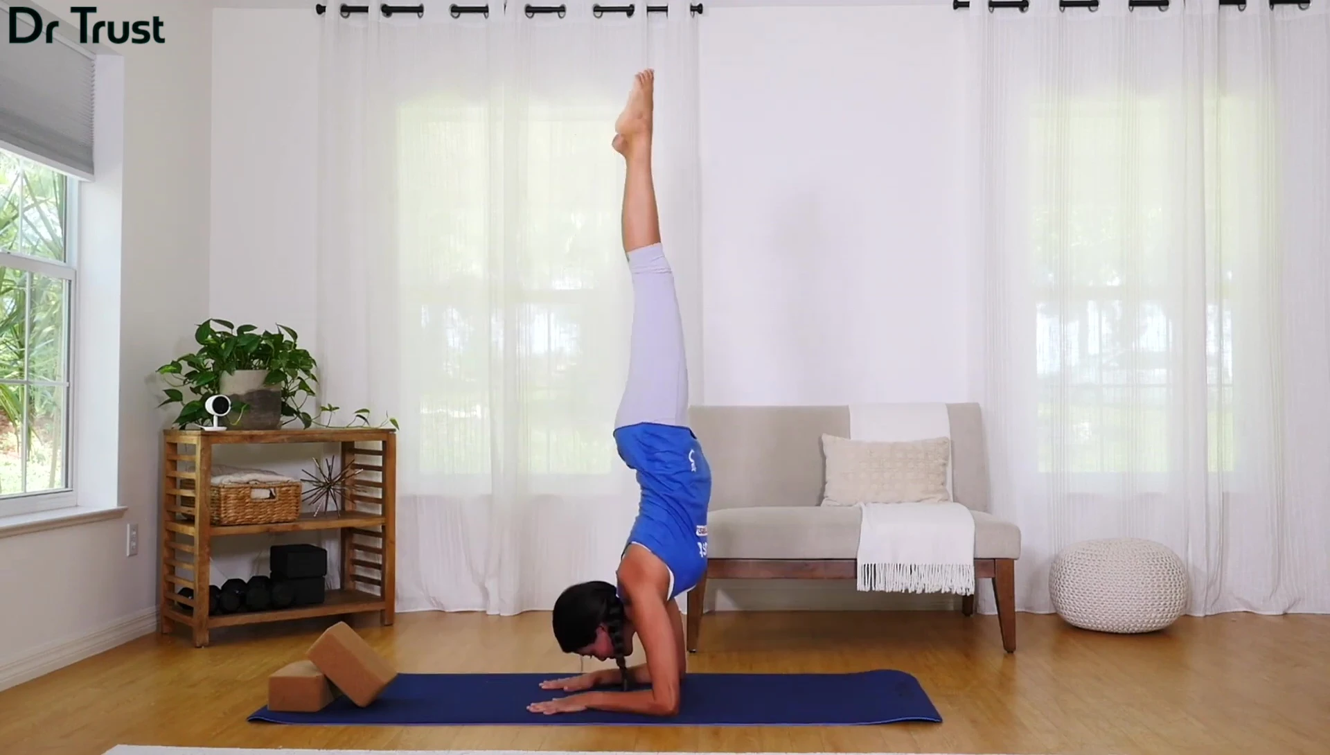 A person performing a more advanced yoga posture showcasing the mat's stability.